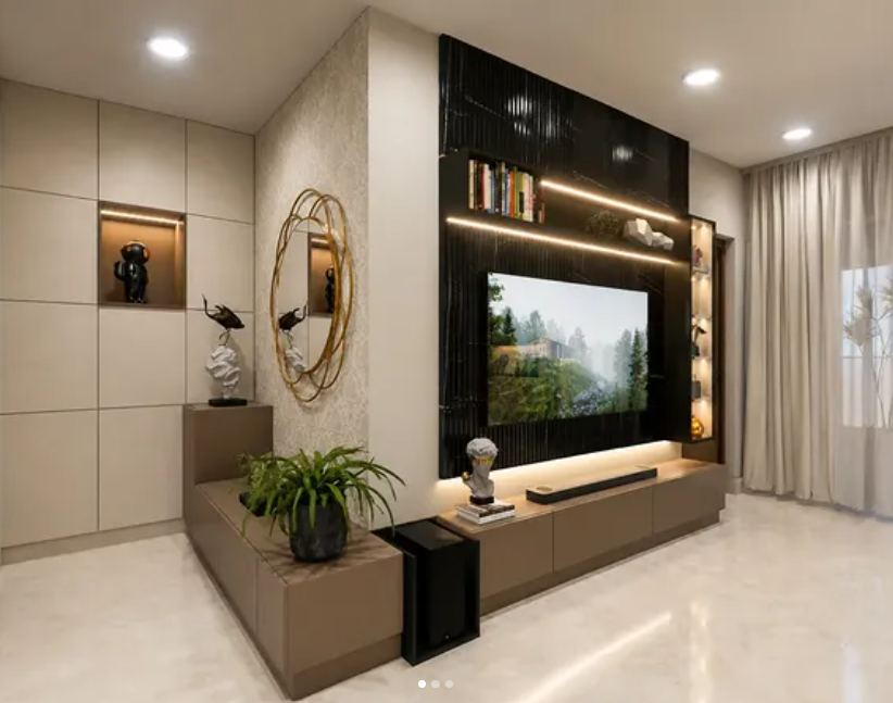 Foyer to living — round mirror console, backlit TV wall